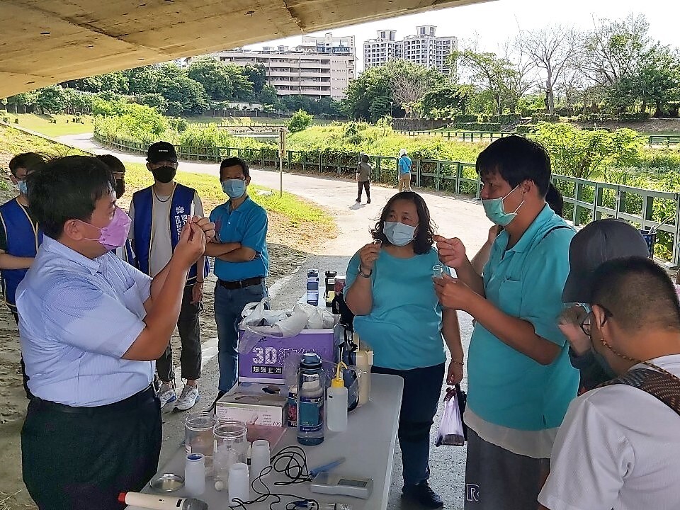 Participants learn to operate instruments testing samples.